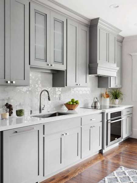 white countertops with light cupboards