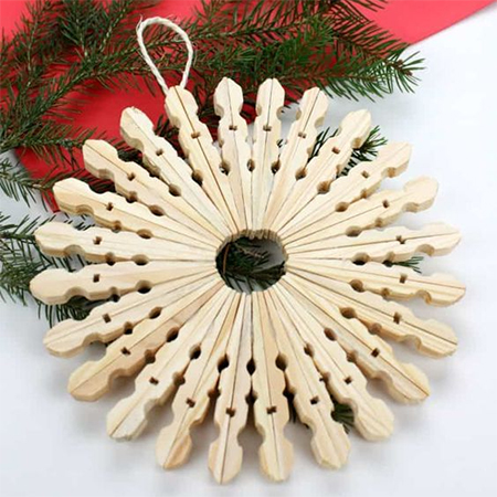 Make Christmas Snowflakes with Clothes Pegs