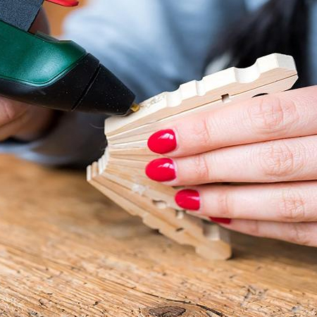 Make Christmas Snowflakes with Clothes Pegs