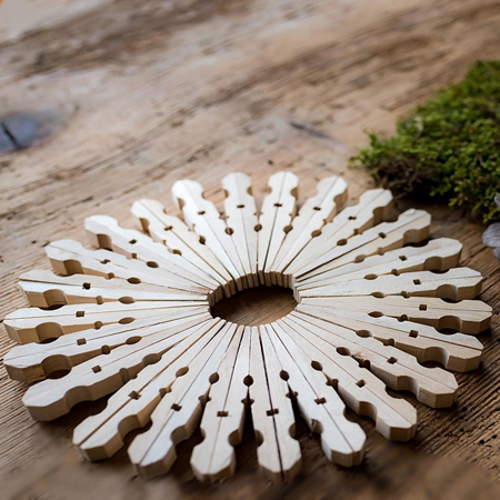 Make Christmas Snowflakes with Clothes Pegs