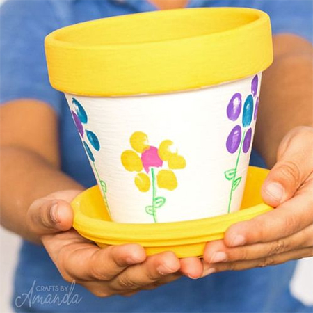 children paint flower pots