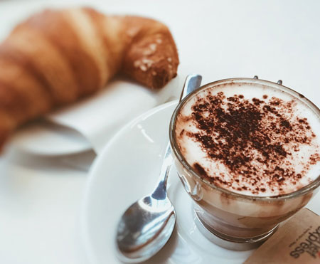Consume caffeine with food