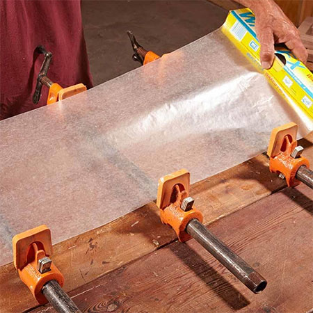 put wax paper on your work surface to prevent glue sticking