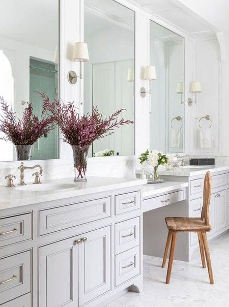 use a large mirror to bring interest into a bathroom