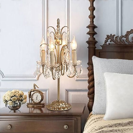 splurge on luxury lighting for a bedroom