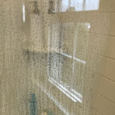 remove soap scum from shower doors