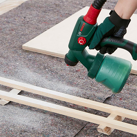 apply paint with spray gun