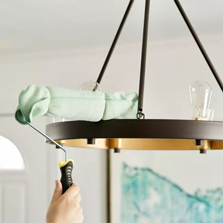 CLEAN LIGHT FITTINGS WITH A PAINT ROLLER