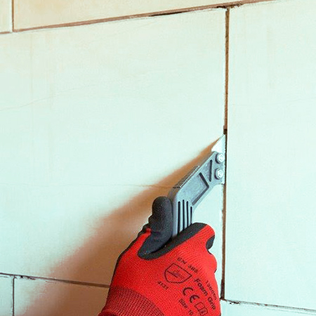 REPAIR GROUT LINES WITH A GROUT RAKE