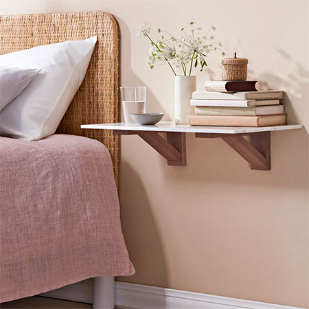 mount a basic shelf next to the bed
