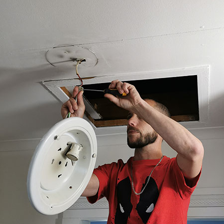 replace old light fittings with energy efficient fittings