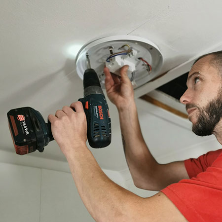 replace old light fittings with energy efficient fittings