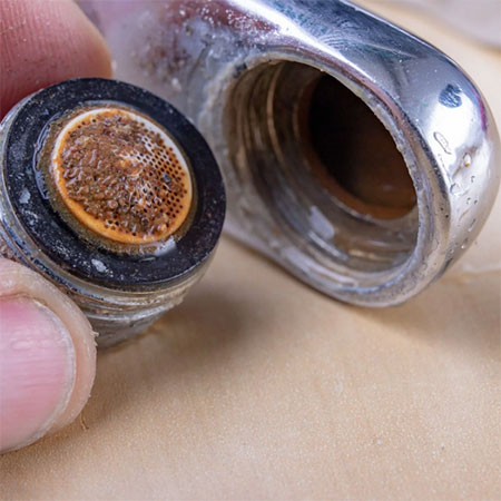 what causes tap water to slow down