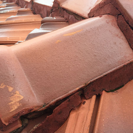 how to fix loose roof ridge caps