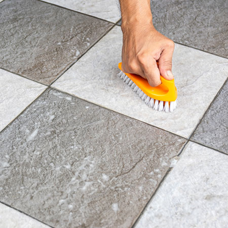 sand tile floor before painting