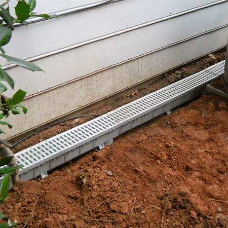 gutter french drain for water logged garden