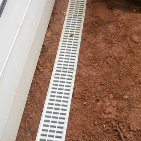 gutter french drain for water logged garden