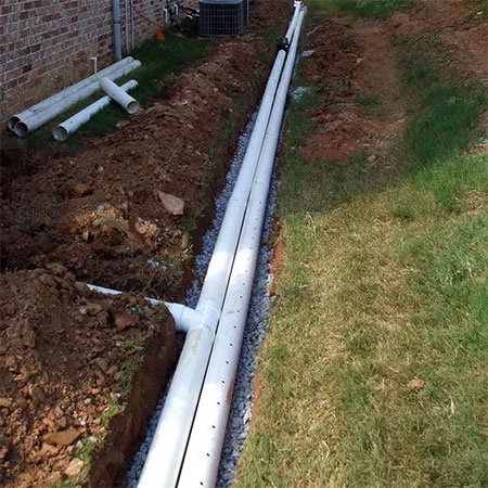 pvc pipe french drain to direct water away from property