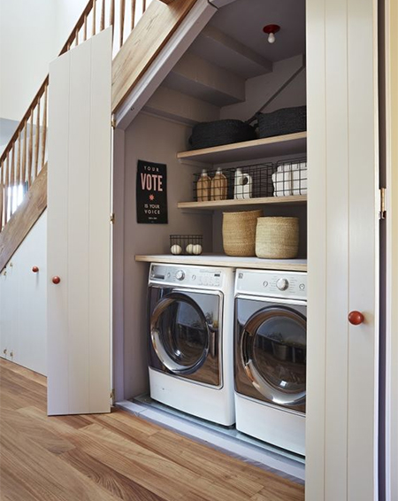 laundry room under staircase