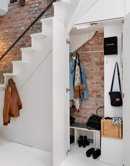 mudroom under staircase