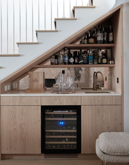 wet home bar under stairs