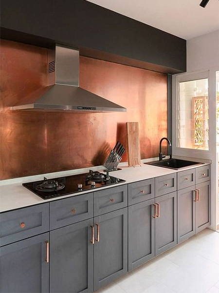 copper back splash in modern kitchen
