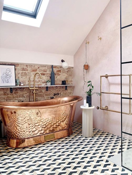 copper bathtubs and fittings in bathroom