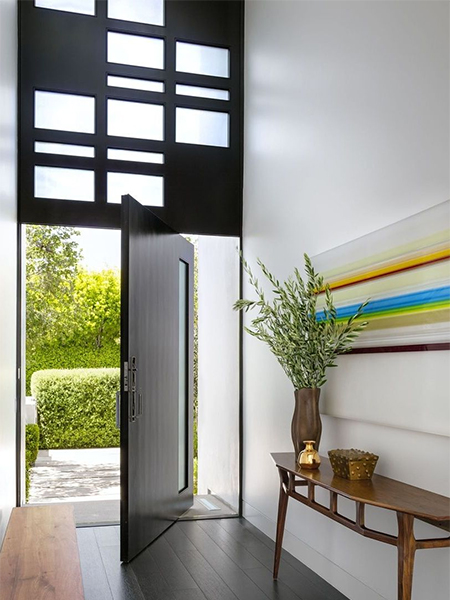 dark wall above entrance door