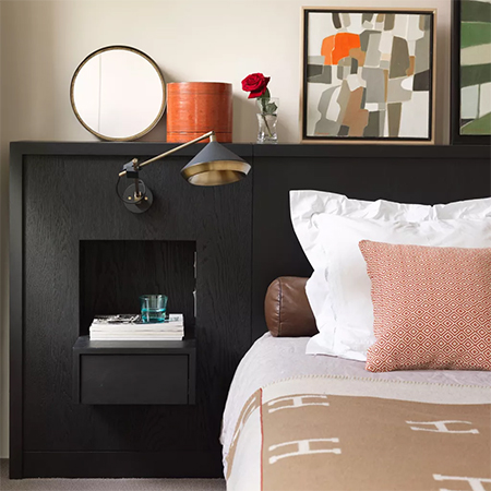 storage headboard behind bed