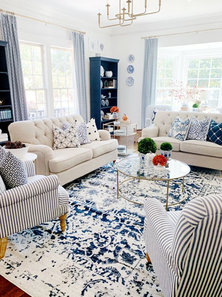 white room blue rug blue accessories