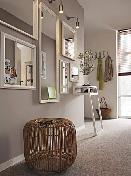 collection of mirrors on wall