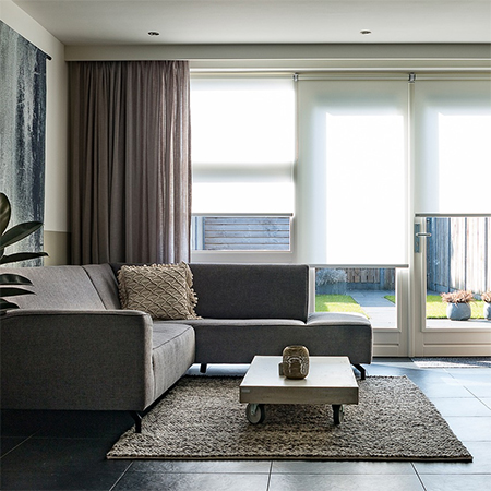 hang curtains as high as possible