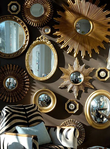 wall of mirrors with dark wall colour