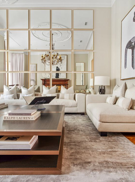 wall of mirrors in living room
