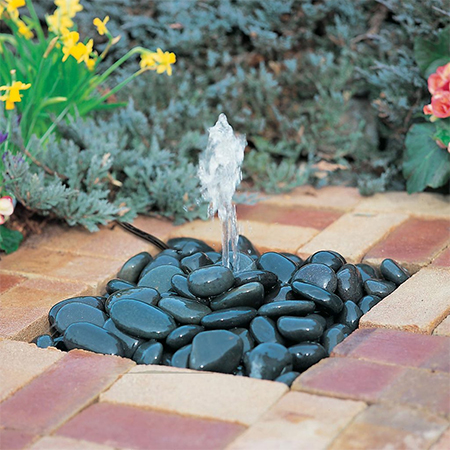 Build a Simple, Yet Stunning, Water Feature for your Garden