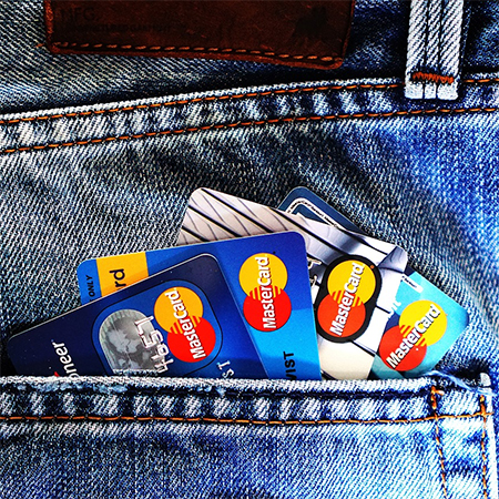 How do Credit Card Consolidation Companies Work to Reduce Your Debt?