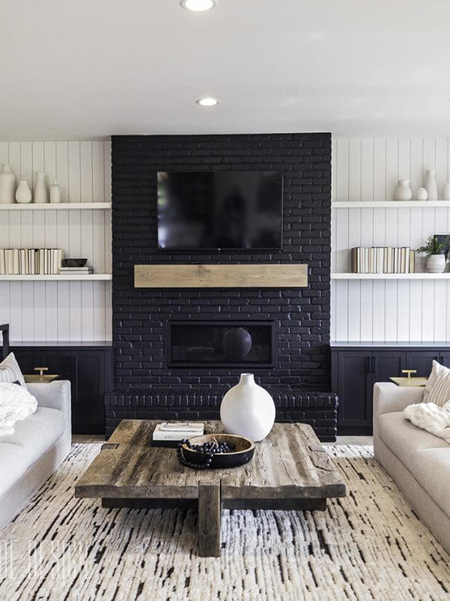 black painted brick tv feature wall