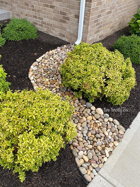 dry river bed at downspout