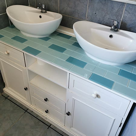 cut curved tiles to fit around sink or toilet
