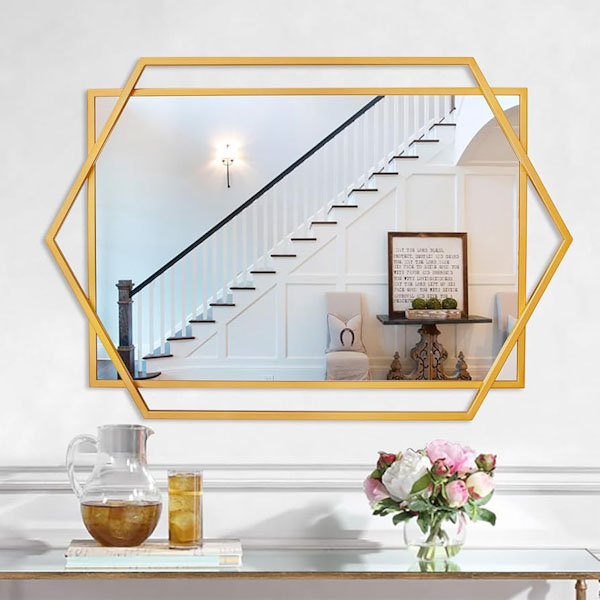 The entryway is the first impression of your home, so mirror placement here is key.
