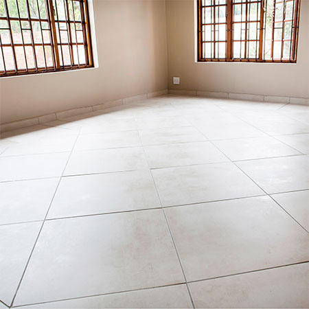how to tile over existing tiled floor