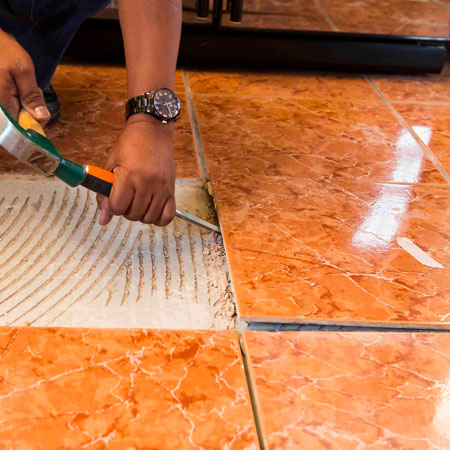 How to lay tiles over existing tiled floor