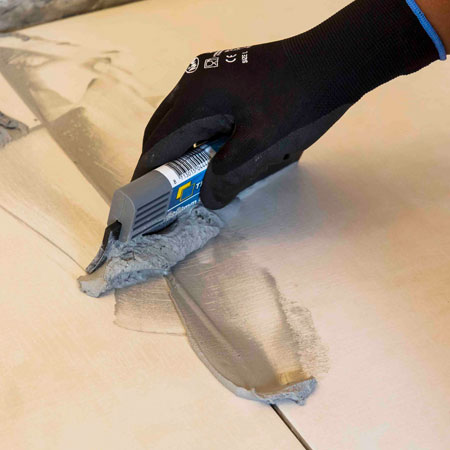 How to lay tiles over existing tiled floor