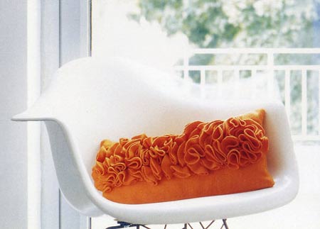 Cushion with rosette clusters 