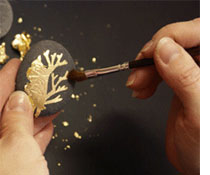 Pebbles with gold leaf design