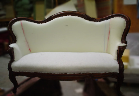 Reupholstered Victorian loveseat