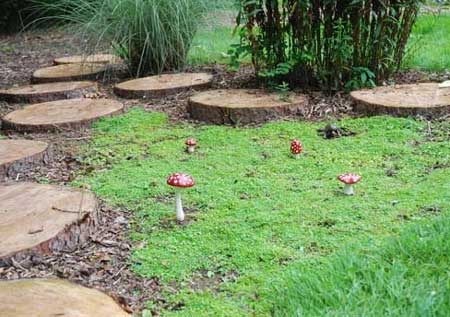here's a great idea for making a pathway around your veggies or flower beds