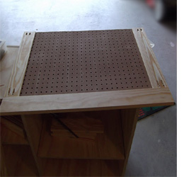 Make a wall-mounted storage cabinet for a garage 