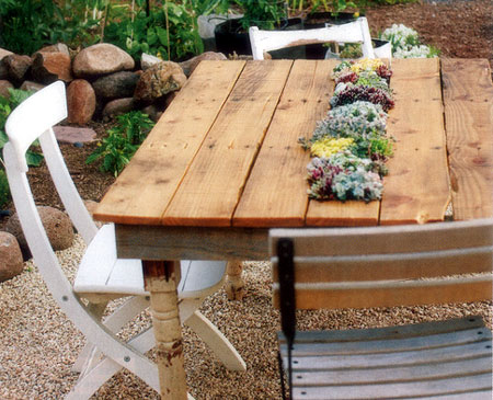 reclaimed wood table with succulent plants in centre for garden, patio or deck
